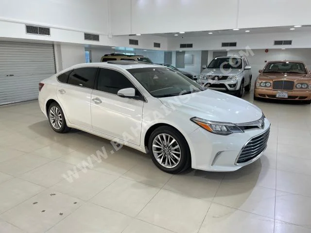 Toyota  Avalon  Limited  2016  Sedan  Automatic  6  116,700  RWD  White  Gasoline