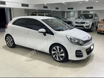 Kia  Rio  2016  Hatchback  Automatic  4  87,800  FWD  White  Gasoline