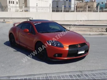 Mitsubishi  Eclipse  2009  Coupe / Sport  Automatic  6  158,500  RWD  Orange  Gasoline