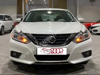 Nissan  Altima  2.5 S  2017  Sedan  Automatic  4  135,000  FWD  White  Gasoline