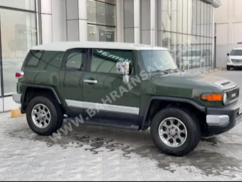 Toyota  FJ Cruiser  2011  SUV  Automatic  6  230,500  4WD  Green  Gasoline