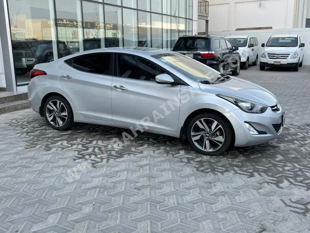 Hyundai  Elantra  2015  Sedan  Automatic  4  91,100  FWD  Silver  Gasoline