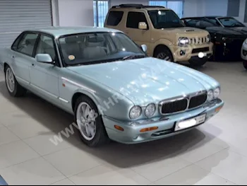 Jaguar  XJ  8  1998  Sedan  Automatic  8  18,900  RWD  Green  Gasoline