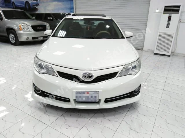 Toyota  Camry  GLX  2013  Sedan  Automatic  4  159,000  RWD  White  Gasoline