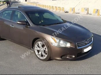 Nissan  Maxima  2012  Sedan  Automatic  6  145,700  RWD  Brown  Gasoline