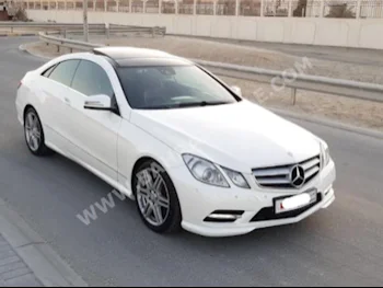 Mercedes-Benz  E-Class  200  2013  Sedan  Automatic  4  77,200  FWD  White  Gasoline