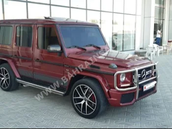 Mercedes-Benz  G-Class  55 AMG  2011  SUV  Automatic  8  122,600  4WD  Red  Gasoline