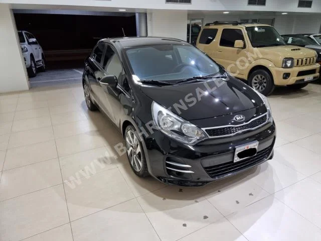 Kia  Rio  2016  Hatchback  Automatic  4  111,400  FWD  Black  Gasoline