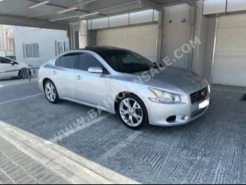Nissan  Maxima  2012  Sedan  Automatic  6  130,800  RWD  Silver  Gasoline