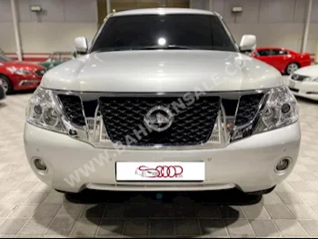 نيسان  باترول  اس اي  2013  فان \ باص  اتوماتك  8  136,000  دفع رباعي  رمادي  بنزين