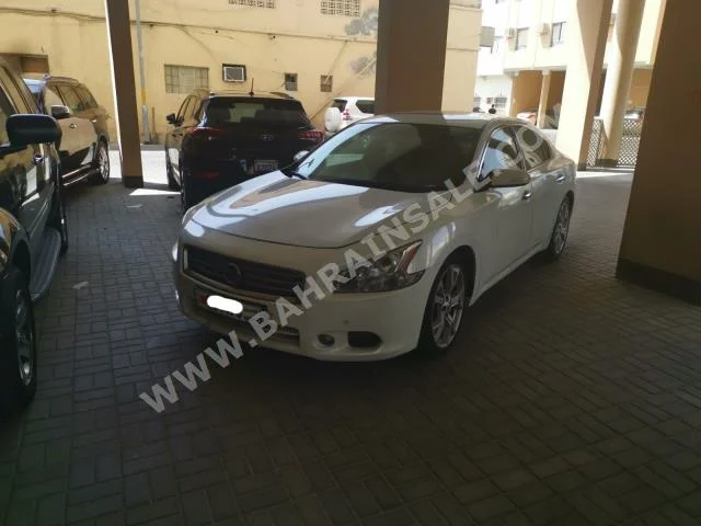 Nissan  Maxima  2014  Sedan  Automatic  6  118,000  RWD  White  Gasoline