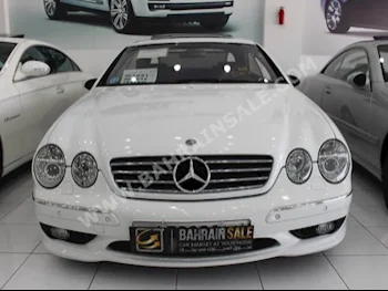 Mercedes-Benz  CL-Class  55 AMG  2001  Sedan  Automatic  8  87,000  RWD  White  Gasoline
