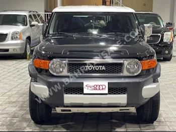 تويوتا إف جي كروزر 2009 فان \ باص اتوماتك 6 230,000 دفع رباعي أسود بنزين