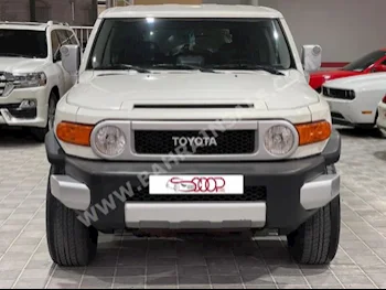 تويوتا إف جي كروزر 2012 فان \ باص اتوماتك 6 160,000 دفع رباعي أبيض بنزين