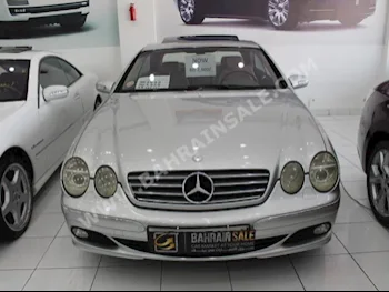 Mercedes-Benz  CL-Class  500  2003  Sedan  Automatic  8  147,000  FWD  Silver  Gasoline