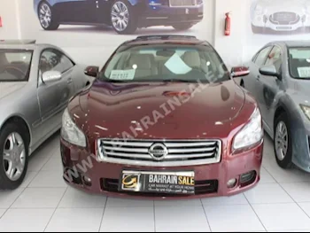 Nissan  Maxima  2013  Sedan  Automatic  6  70,000  FWD  Maroon  Gasoline