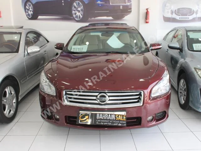 Nissan  Maxima  2013  Sedan  Automatic  6  70,000  FWD  Maroon  Gasoline