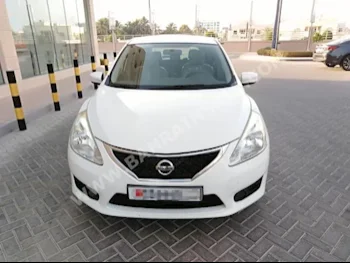 Nissan  Tiida  2014  Sedan  Automatic  4  148  FWD  White  Gasoline