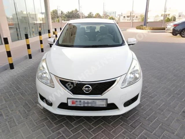 Nissan  Tiida  2014  Sedan  Automatic  4  148  FWD  White  Gasoline