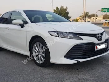 Toyota  Camry  LE  2019  Sedan  Automatic  4  9,900  FWD  White  Gasoline