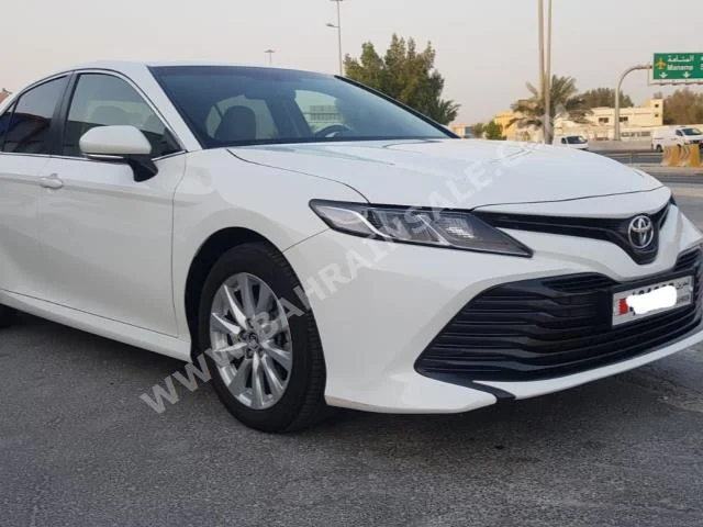 Toyota  Camry  LE  2019  Sedan  Automatic  4  9,900  FWD  White  Gasoline