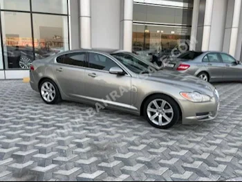 Jaguar  XF  2011  Sedan  Automatic  6  126,400  RWD  Gold  Gasoline