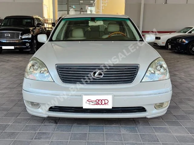 Lexus  LS  430  2002  Sedan  Automatic  8  150,000  RWD  White  Gasoline