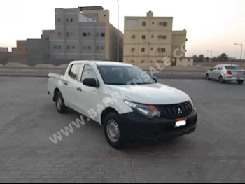 Mitsubishi  L 200  2016  Pick Up  Manual  4  56,500  FWD  White  Gasoline