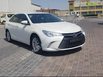 Toyota  Camry  GLX  2017  Sedan  Automatic  4  90,800  FWD  White  Gasoline