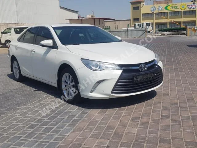 Toyota  Camry  GLX  2017  Sedan  Automatic  4  90,800  FWD  White  Gasoline