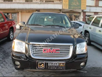 GMC  Envoy  2009  SUV  Automatic  6  102,000  RWD  Black  Gasoline