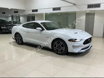 Ford  Mustang  GT  2018  Coupe / Sport  Manual  8  19,000  RWD  White  Gasoline