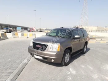 GMC  Yukon  2014  SUV  Automatic  8  104,600  4WD  Brown  Gasoline