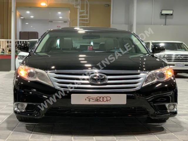 Toyota  Avalon  Limited  2012  Sedan  Automatic  6  140,000  FWD  Black  Gasoline