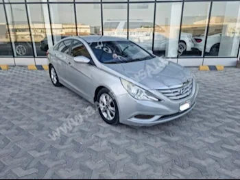 Hyundai  Sonata  2011  Sedan  Automatic  4  133,500  FWD  Silver  Gasoline