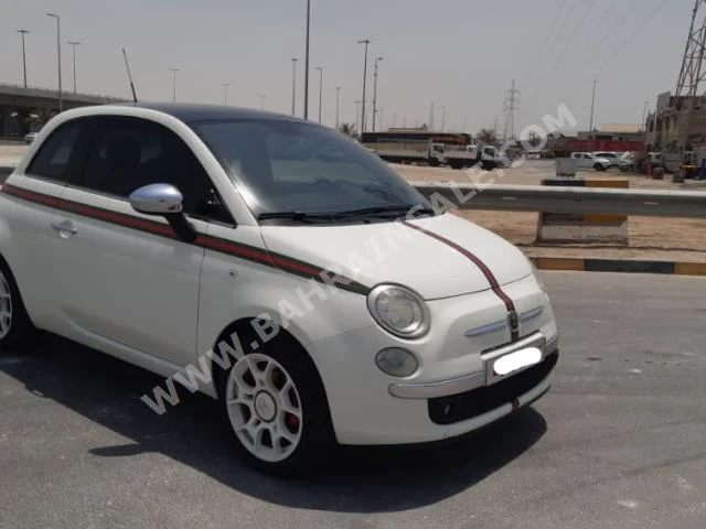 Fiat  500  Gucci  2012  Hatchback  Automatic  4  103,600  FWD  White  Gasoline