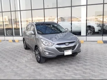 Hyundai  Tucson  2015  SUV  Automatic  4  58,200  FWD  Gray  Gasoline