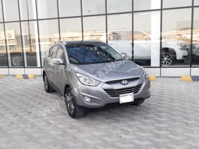 Hyundai  Tucson  2015  SUV  Automatic  4  58,200  FWD  Gray  Gasoline
