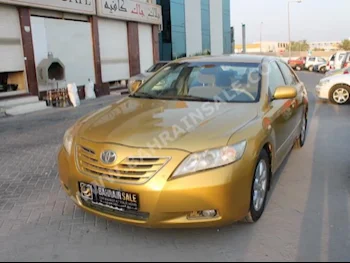 Toyota  Camry  GLX  2007  Sedan  Automatic  4  200,000  FWD  Gold  Gasoline