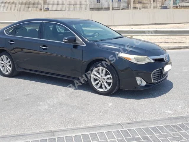 تويوتا أفالون اكس ال اي 2013 سيدان اتوماتك 6 147,600 دفع خلفي أسود بنزين