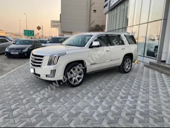 كاديلاك  اسكيليد  2015  اس يو في  اتوماتك  8  65,200  دفع رباعي  أبيض  بنزين