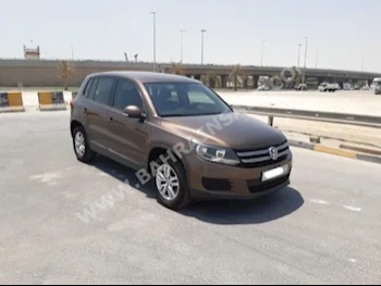 Volkswagen  TIGUAN  2.0 TSI  2015  SUV  Automatic  4  205,400  FWD  Brown  Gasoline