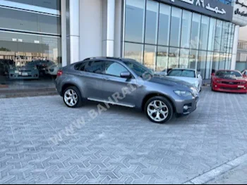 BMW  X-Series  6  2011  SUV  Automatic  6  89,800  RWD  Gray  Gasoline