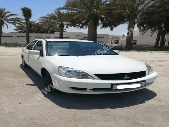 متسوبيشي  لانسر  2011  سيدان  اتوماتك  4  140,000  دفع أمامي  أبيض  بنزين