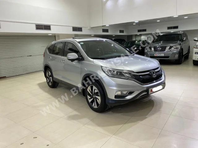 Honda  CRV  2016  SUV  Automatic  4  89,600  RWD  Silver  Gasoline