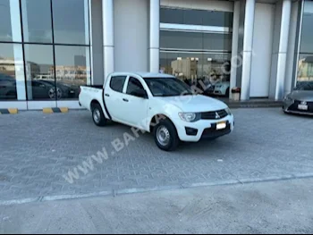متسوبيشي  ال 200  2015  بيكب  عادي  4  67,500  دفع أمامي  أبيض  بنزين