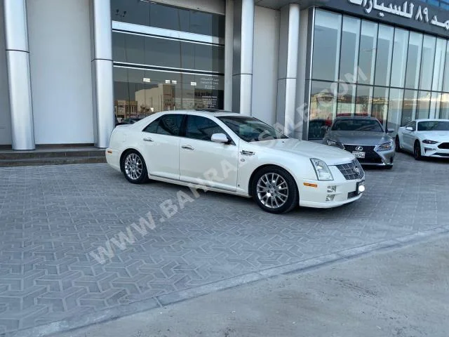 Cadillac  STS  2008  Sedan  Automatic  8  146,000  RWD  White  Gasoline