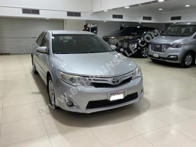Toyota  Camry  GLX  2014  Sedan  Automatic  4  171,100  FWD  Silver  Gasoline