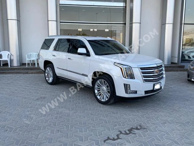Cadillac  Escalade  Platinum  2016  SUV  Automatic  8  102,500  4WD  White  Gasoline
