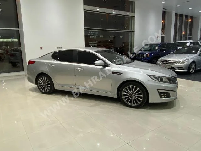 Kia  Optima  2.0  2015  Sedan  Automatic  4  118,300  FWD  Silver  Gasoline